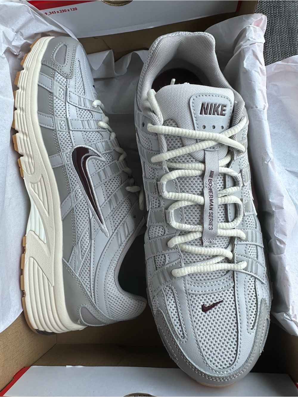 Nike Men’s Light Grey Athletic Sneakers with Maroon Swoosh